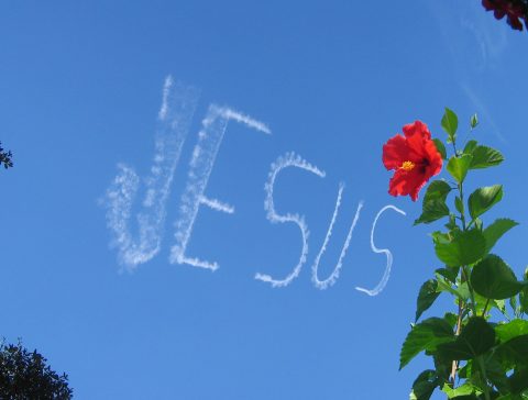 i took this photo just as the skywriting plane finished writing jesus in the sky over orlando florida.